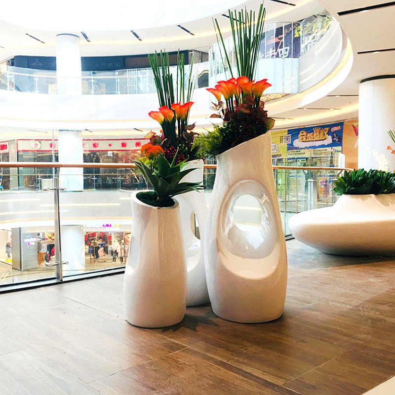 深圳玻璃钢厂如何布置玻璃钢花盆来吸引顾客的目光