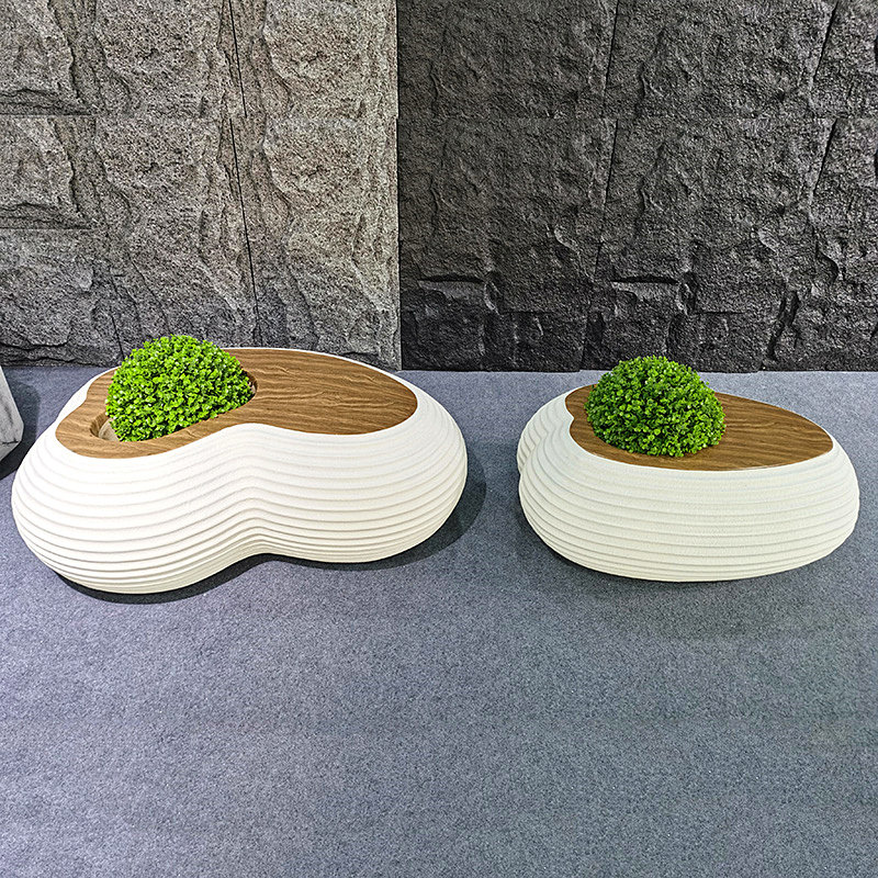 玻璃钢鹅卵石休闲座椅软包沙发现代美陈室内装饰商场造型石头坐凳